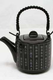 Czarny ceramiczny zestaw do herbaty z orientalnymi napisami